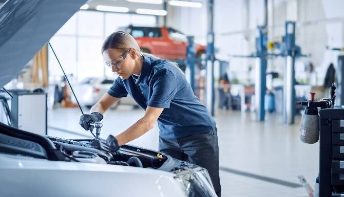 Mechanic working on a car